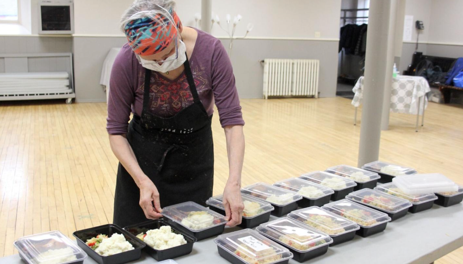 woman packing meals