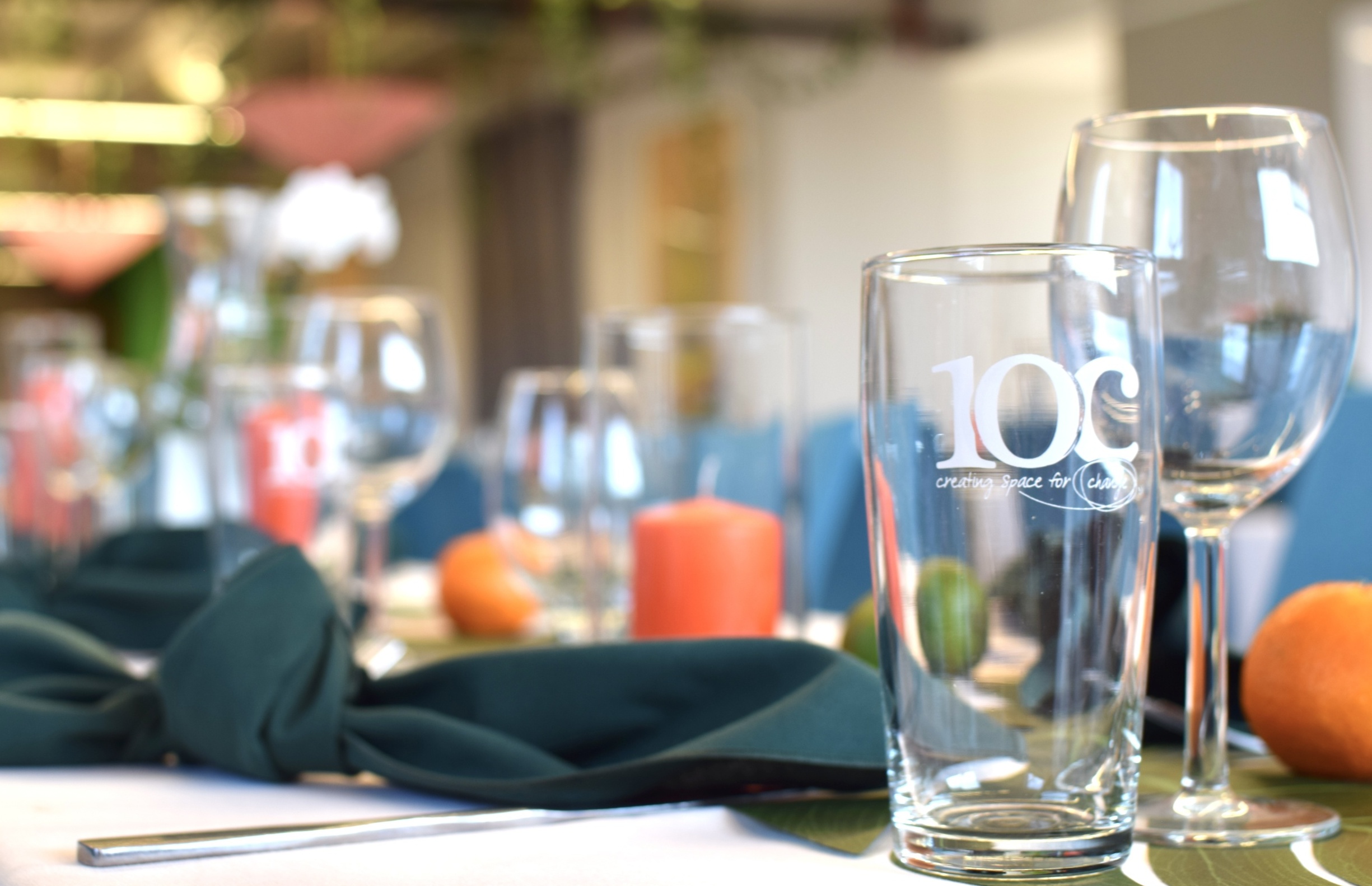 10C branded glass on a formal dinning setting