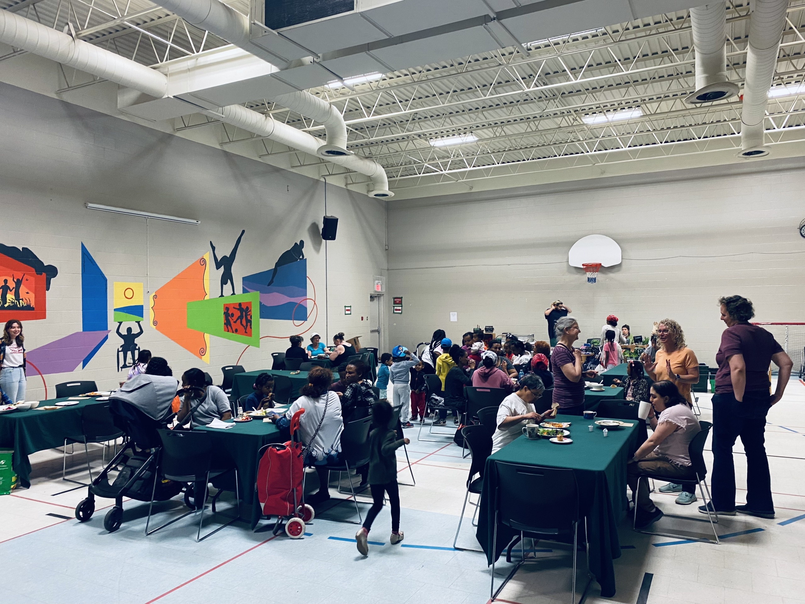 Community Members enjoying lunch in the Shelldale Gym